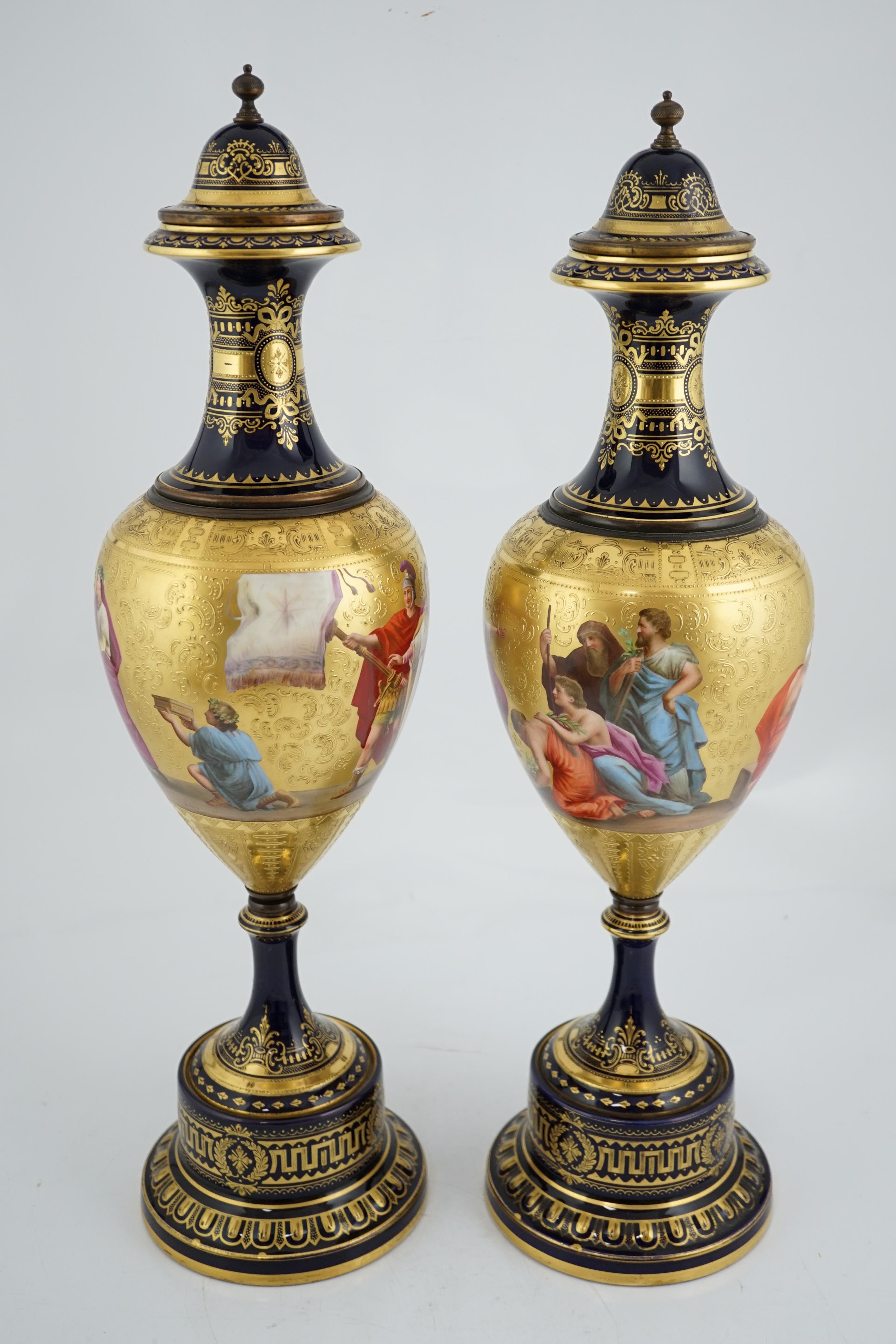 A pair of tall Vienna style porcelain vases and covers, early 20th century
